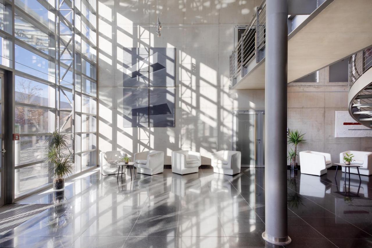 Four Munich Neue Messe Hotel Ашхайм Екстериор снимка
